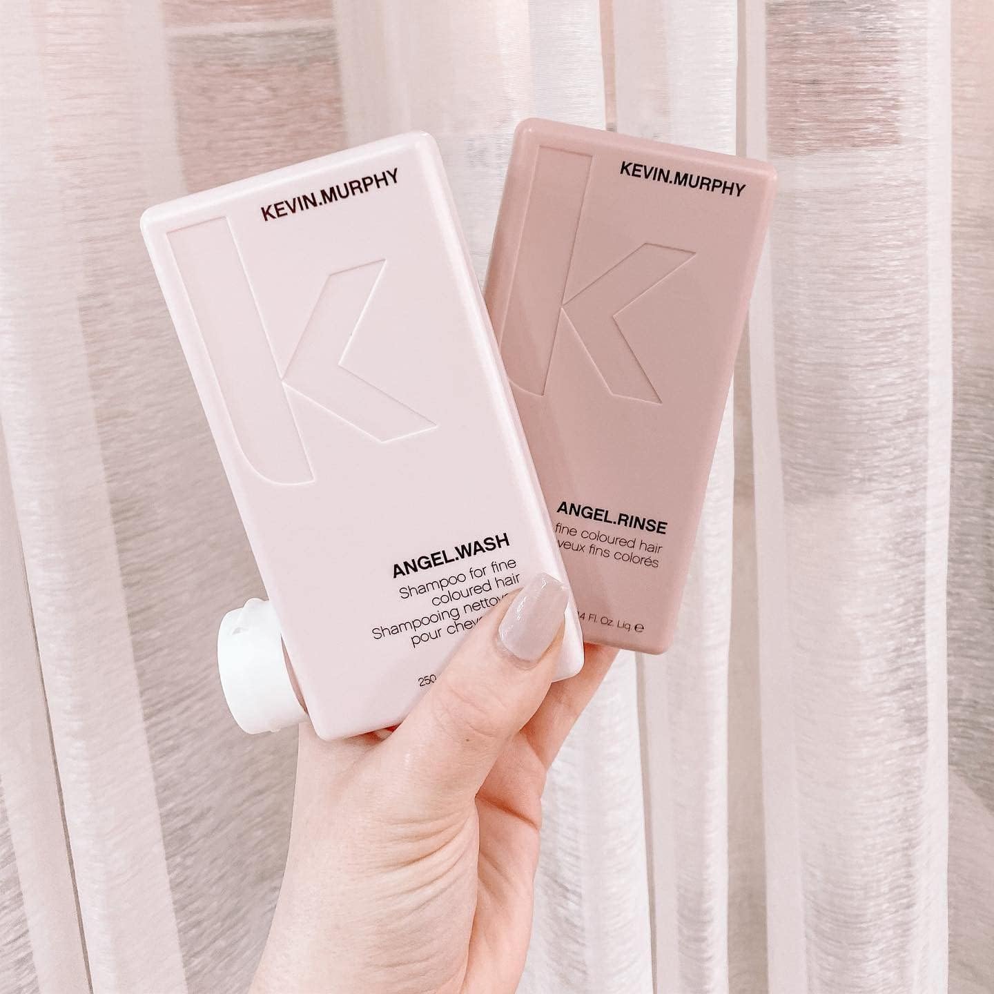 Kevin Murphy Angel Rinse bottle—light conditioning for fragile, color-treated hair