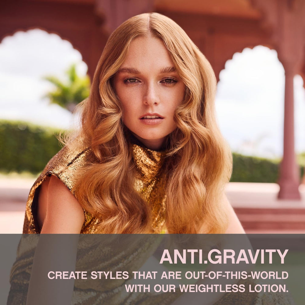 KEVIN.MURPHY ANTI.GRAVITY bottle pour demonstrates easy release for quick styling.