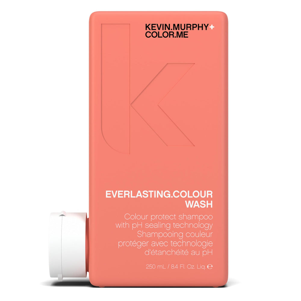 KEVIN.MURPHY Everlasting Colour Wash bottle on sink, highlighting colour protection for vibrant hair.