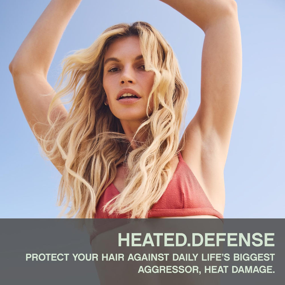 KEVIN.MURPHY Heated.Defense foam-application demonstrates even distribution before heat styling