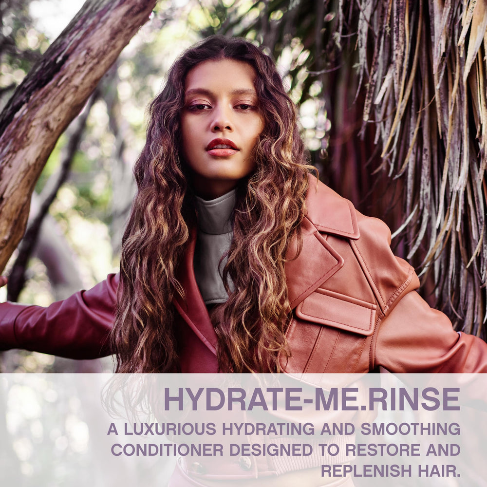 KEVIN.MURPHY Hydrate-Me.Rinse bottle pour demonstrates easy, even application.