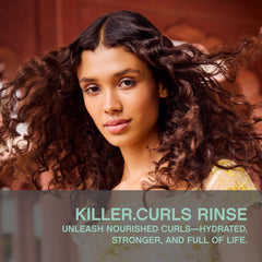 KEVIN.MURPHY KILLER.CURLS RINSE applied to damp hair for soft, defined curls.