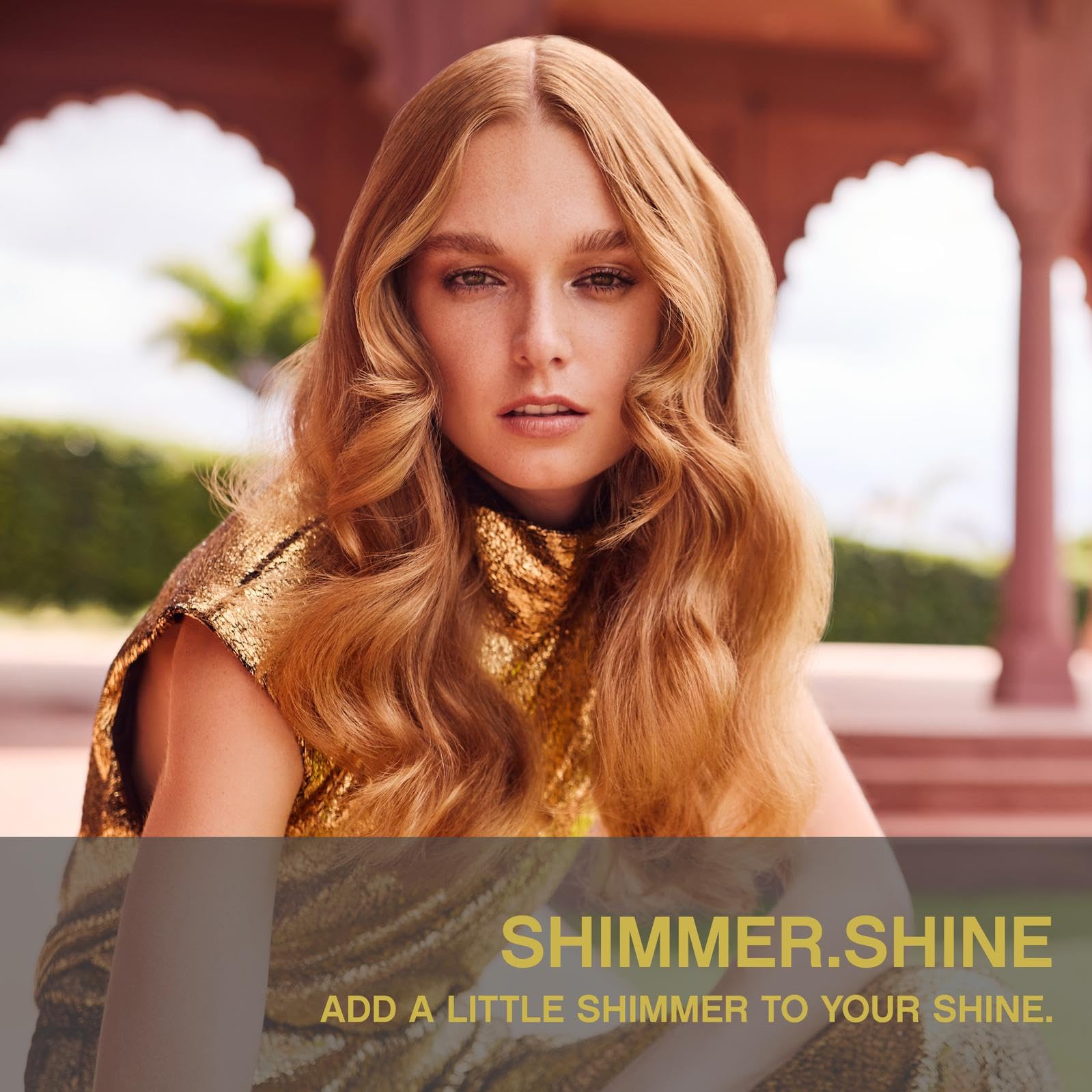 KEVIN.MURPHY SHIMMER.SHINE dispensing spray demonstrates easy, even application.