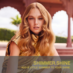 KEVIN.MURPHY SHIMMER.SHINE dispensing spray demonstrates easy, even application.