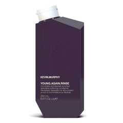 KEVIN.MURPHY YOUNG.AGAIN.RINSE bottle closeup highlighting hydrating formula for ageing hair