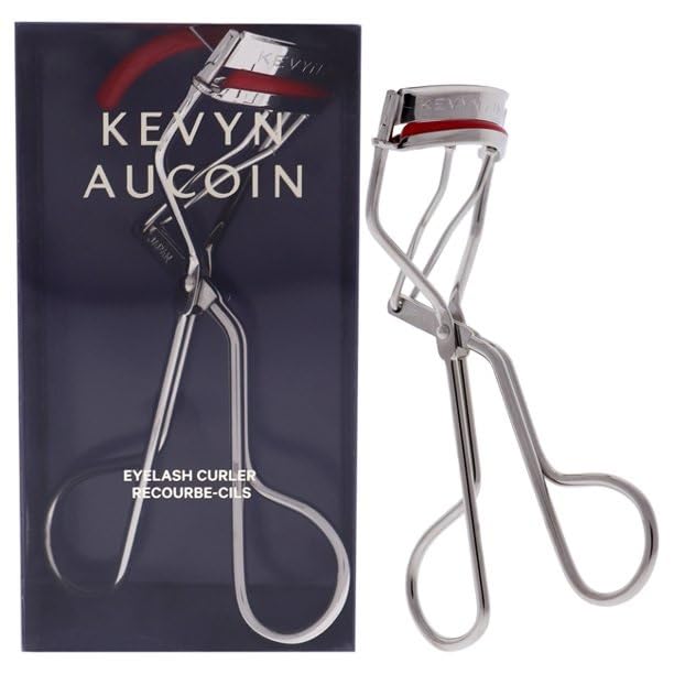 Kevyn Aucoin stainless steel curler close-up shows durable tool for pro results.