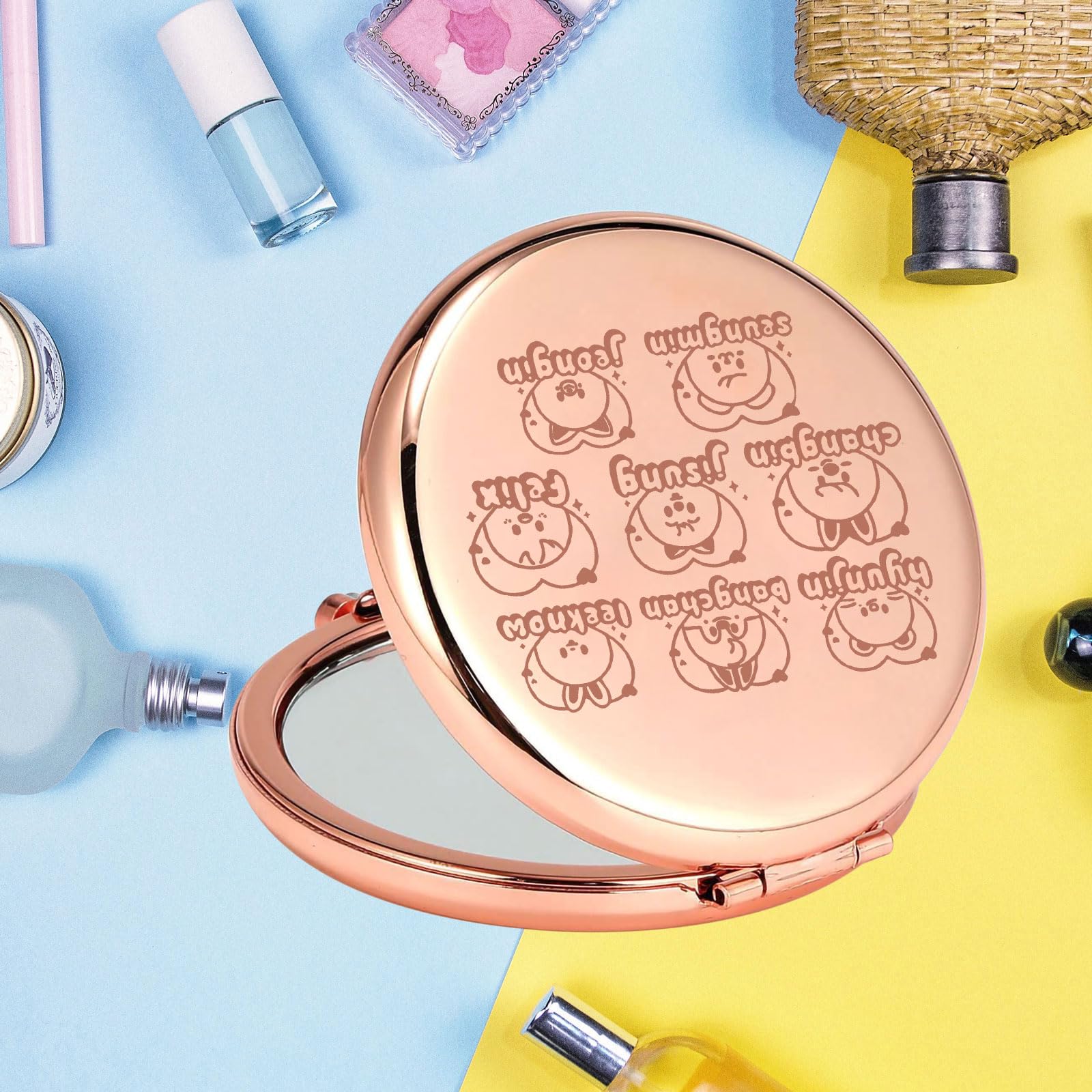 KEYCHIN pocket mirror 6.5 cm diameter fits in purses.