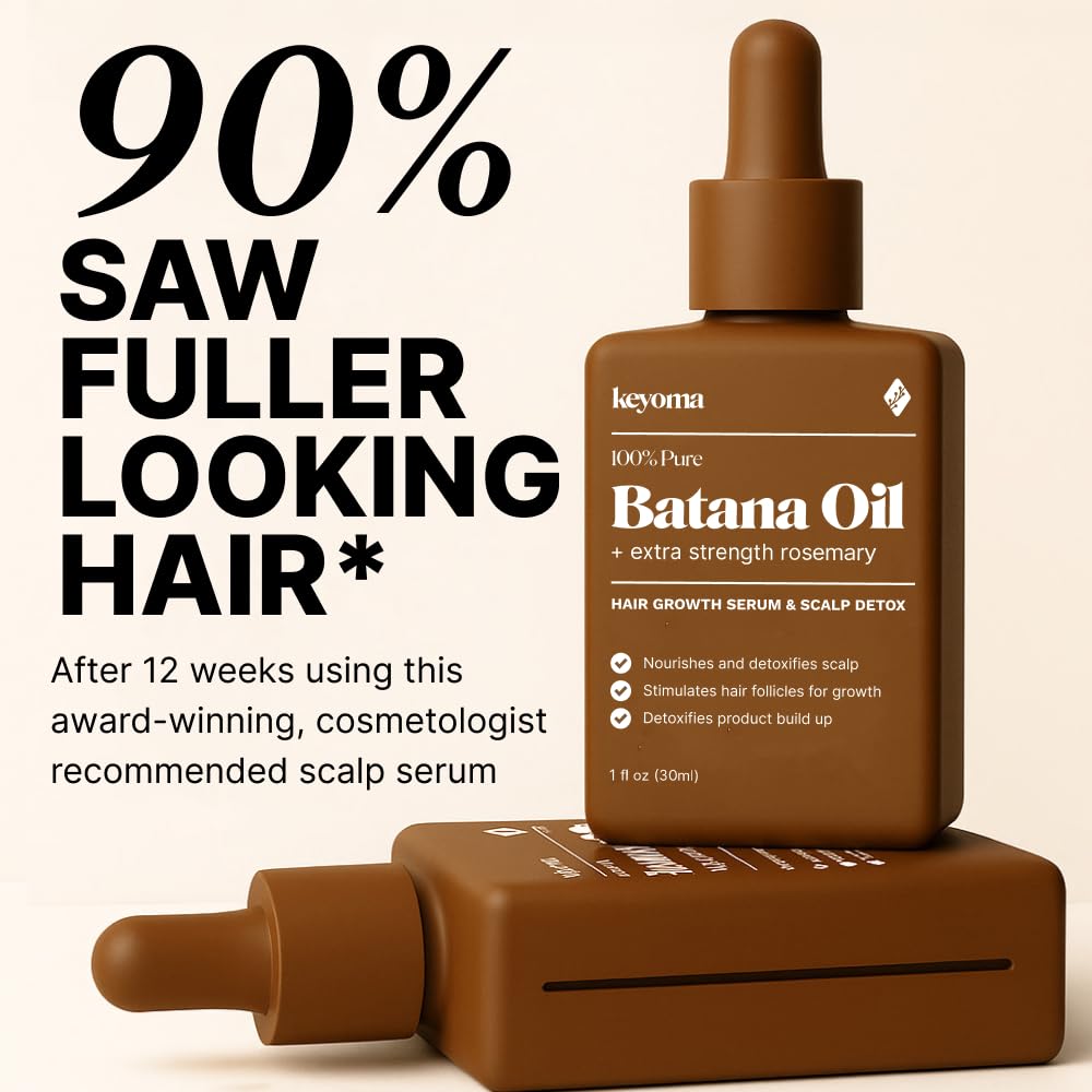 Keyoma Batana Oil rosemary infusion bottle on desk emphasizing antioxidant-rich care