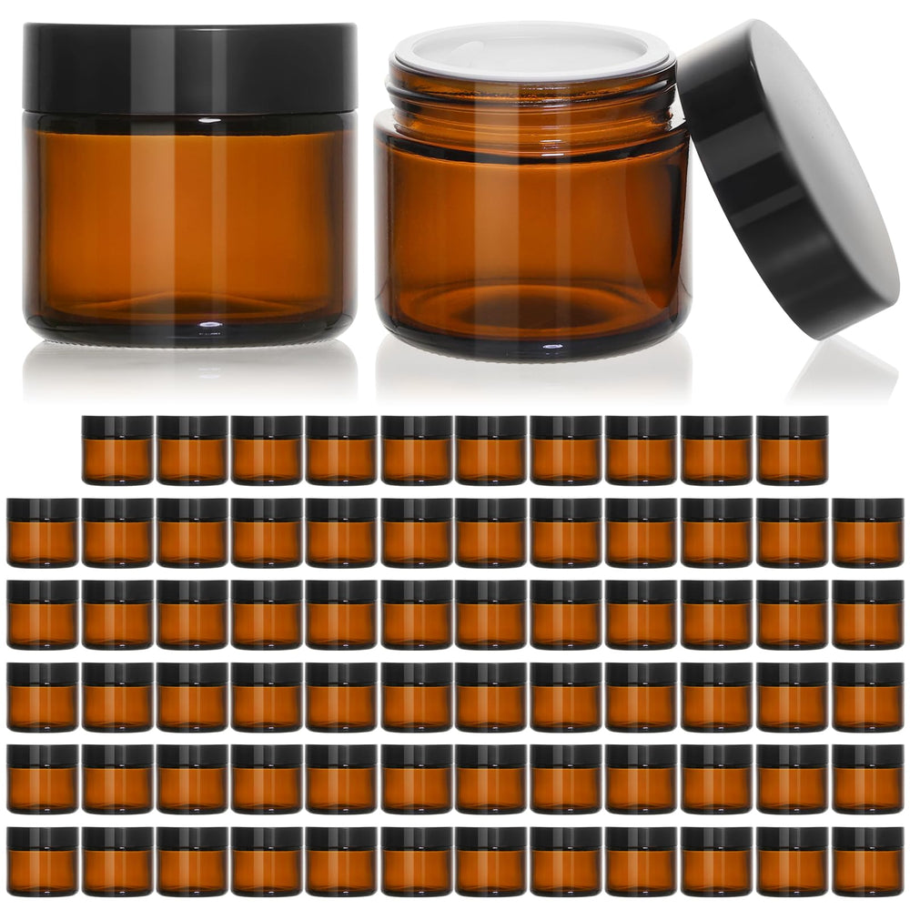 KeyWING 2oz amber glass jar with black lid protects cosmetics from light and leaks.