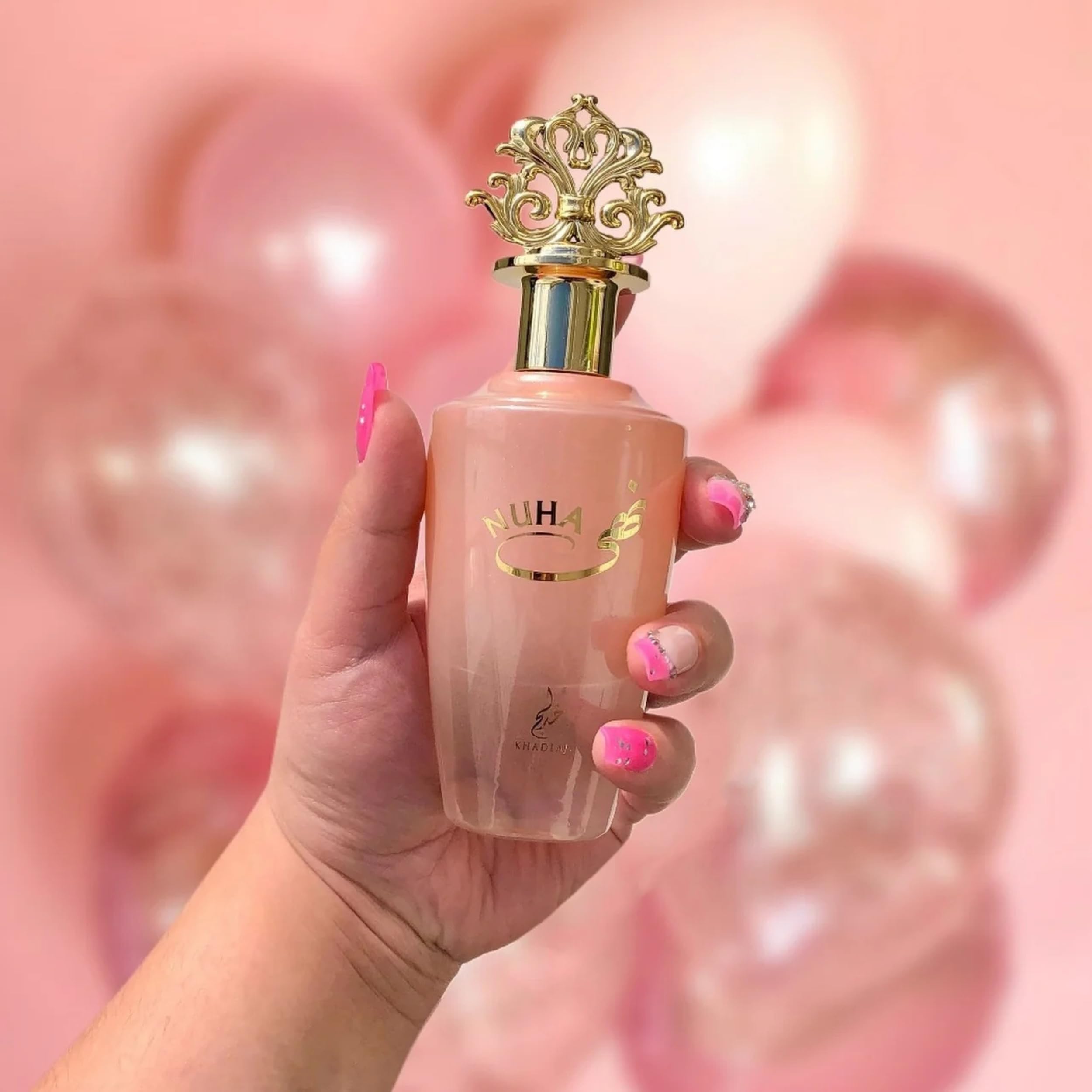 Khadlaj Nuha heart notes of jasmine and rose for elegant everyday allure.