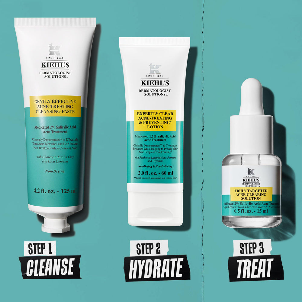Bathroom vanity with Kiehl's Acne-Treating Cleansing Paste for a simple skincare ritual.