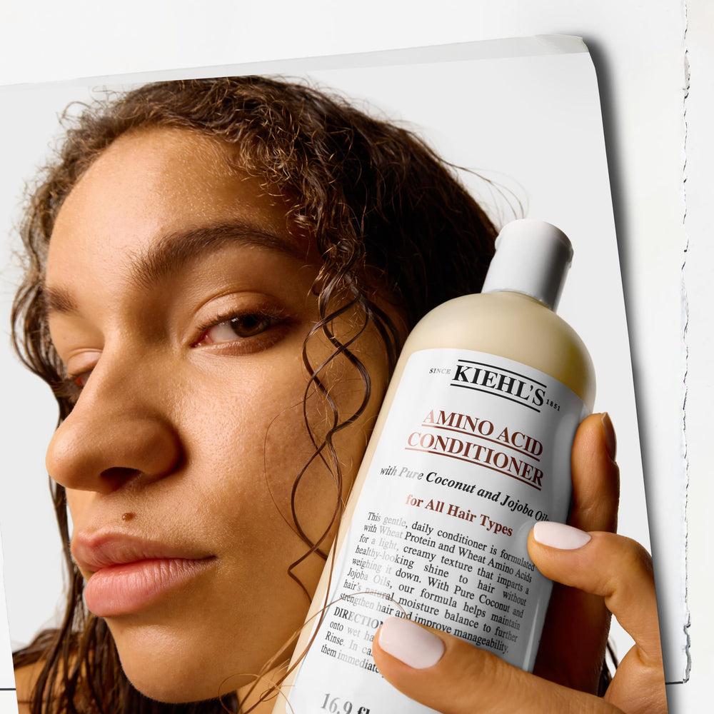 Kiehl's Amino Acid Conditioner hair-shine image conveys smoother, more manageable hair.