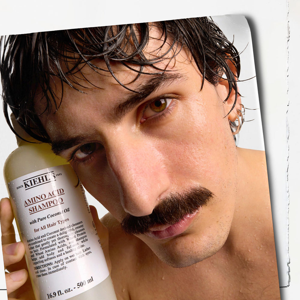 8.4 oz packaging of Kiehl's Amino Acid Shampoo for daily use.