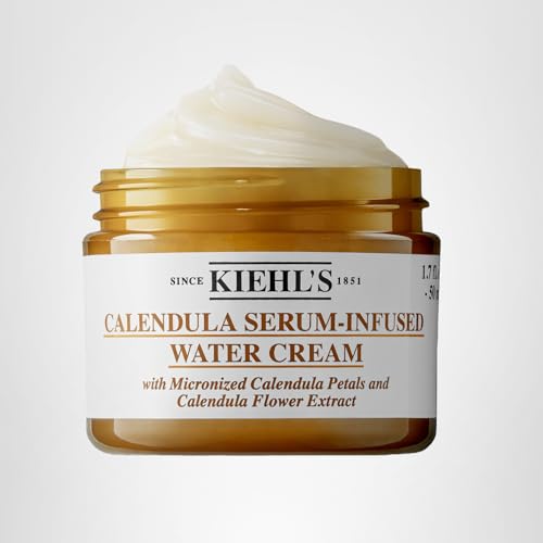 Kiehl's Calendula Serum Infused Water Cream redness relief swatch for even tone.