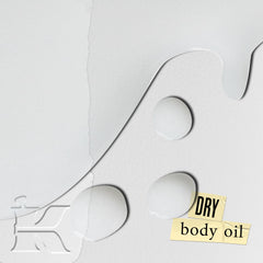 Close-up of Creme de Corps oil absorbing quickly for residue-free dryness.