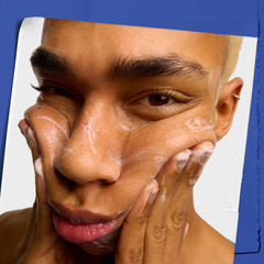 Kiehl's Facial Fuel face wash applied with upward strokes for a refreshed look