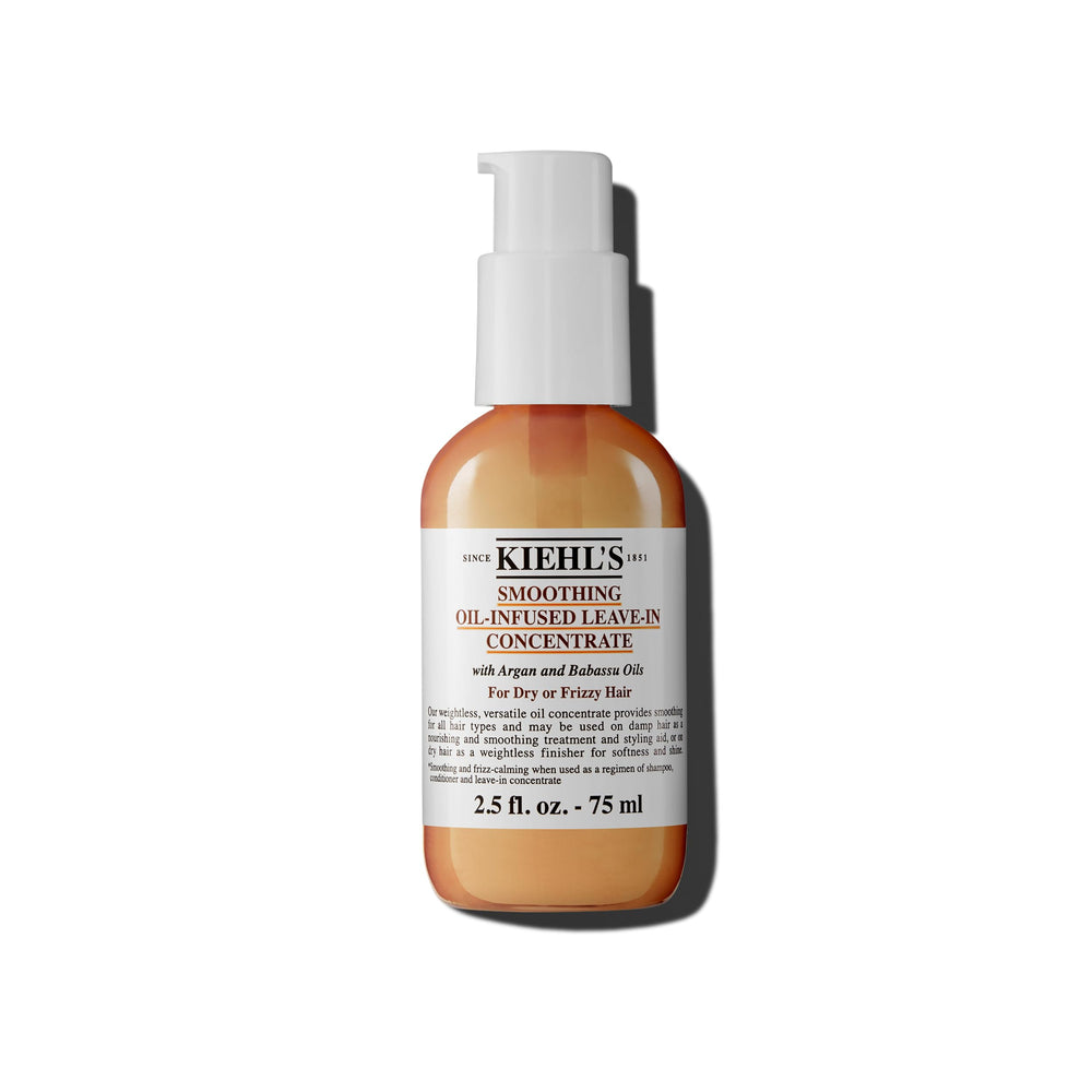 Kiehl's Smoothing Oil bottle shows frizz control and shine.