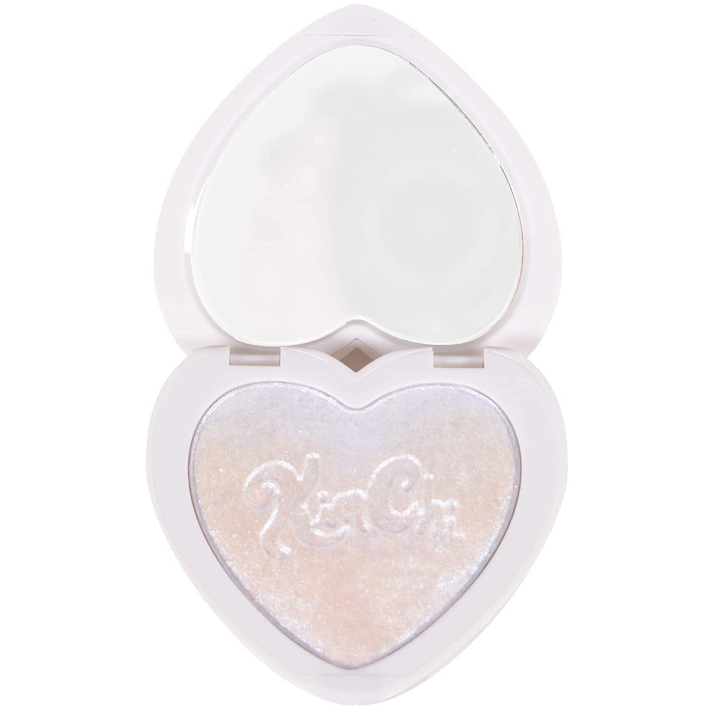 Kimchi Chic Pearl Gone Wild highlighter compact delivers radiant on-the-go shimmer.