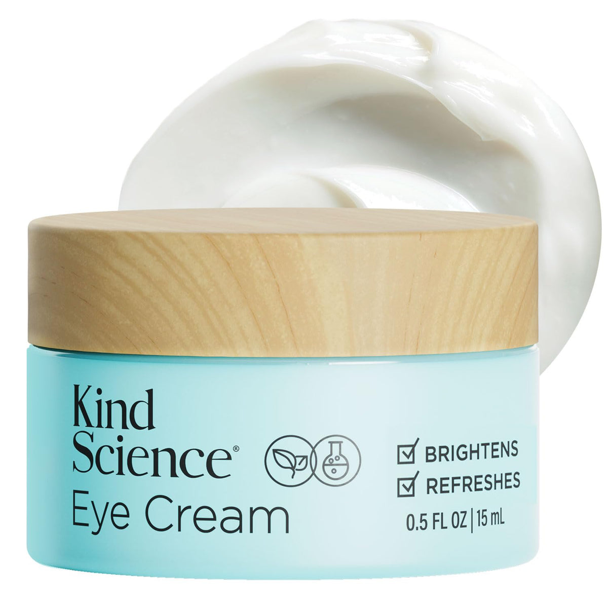 Kind Science eye cream jar showing smooth texture for hydrated under-eye skin.