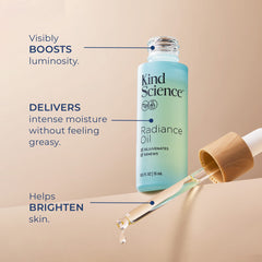 Kind Science Radiance Oil dropper application demonstrates lightweight non-greasy texture
