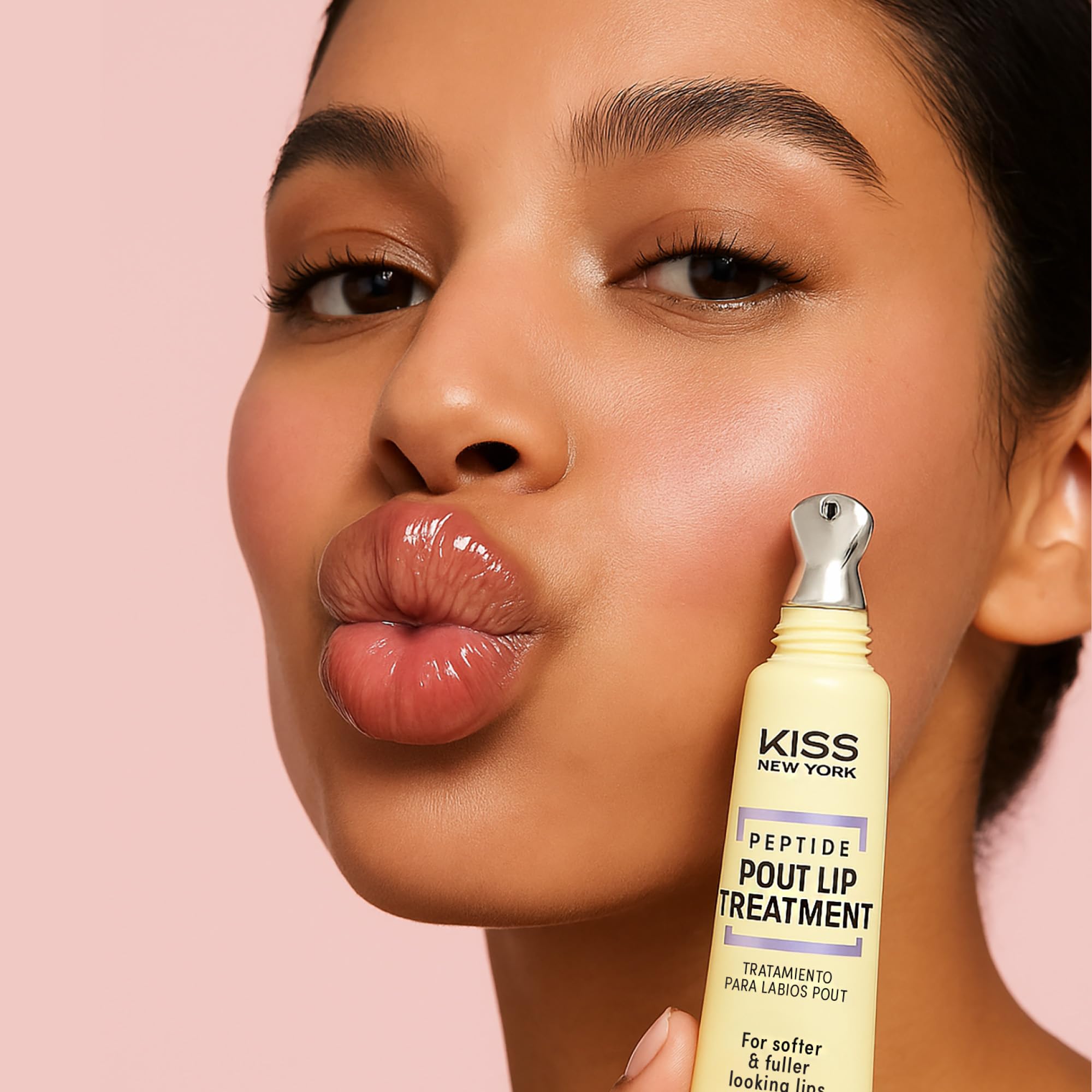 KISS NEW YORK Peptide Lip Treatment on lips shows soft, glossy look