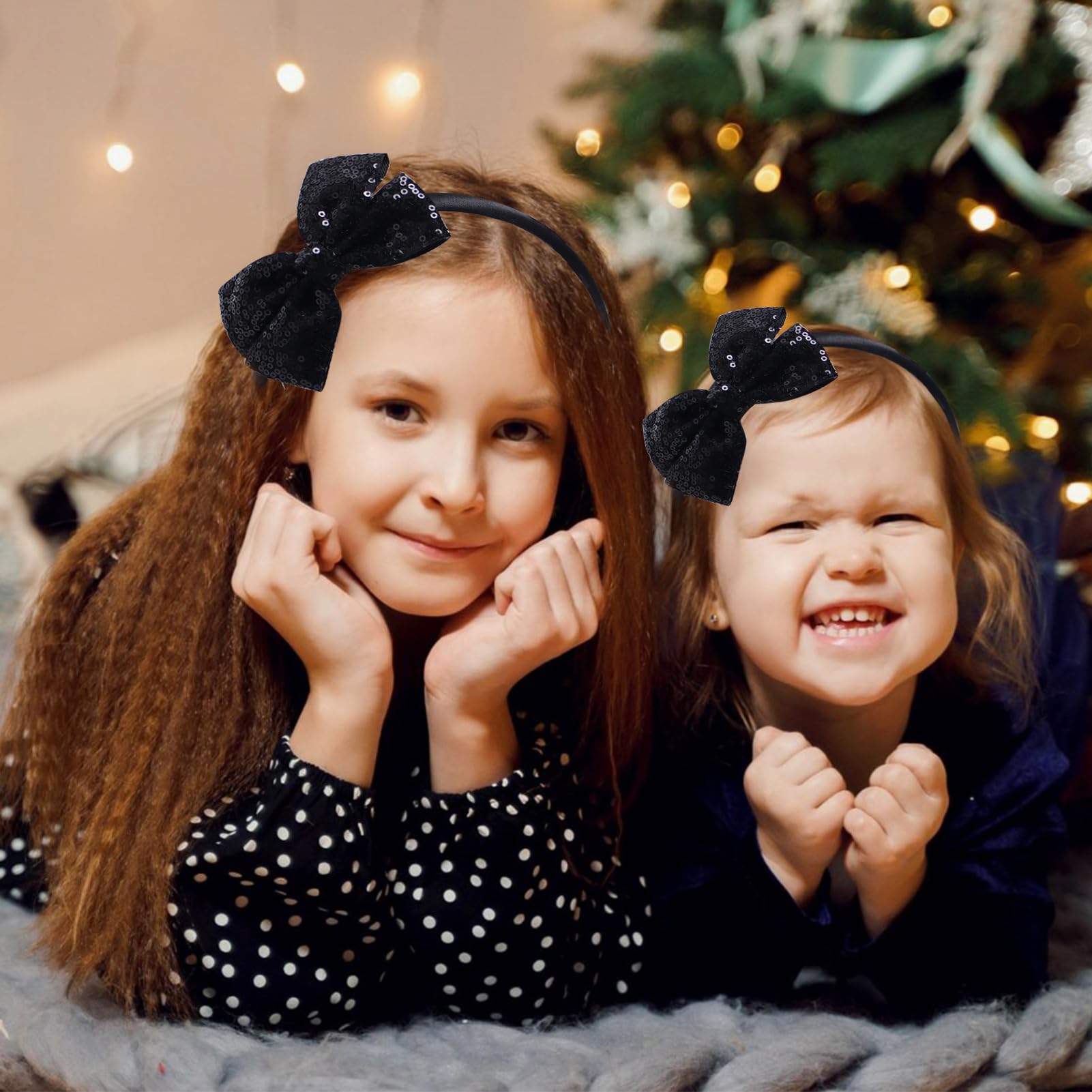 Kiszu Sparkly Sequin Hair Bow Headband black worn by girl adds sparkle to everyday and party looks