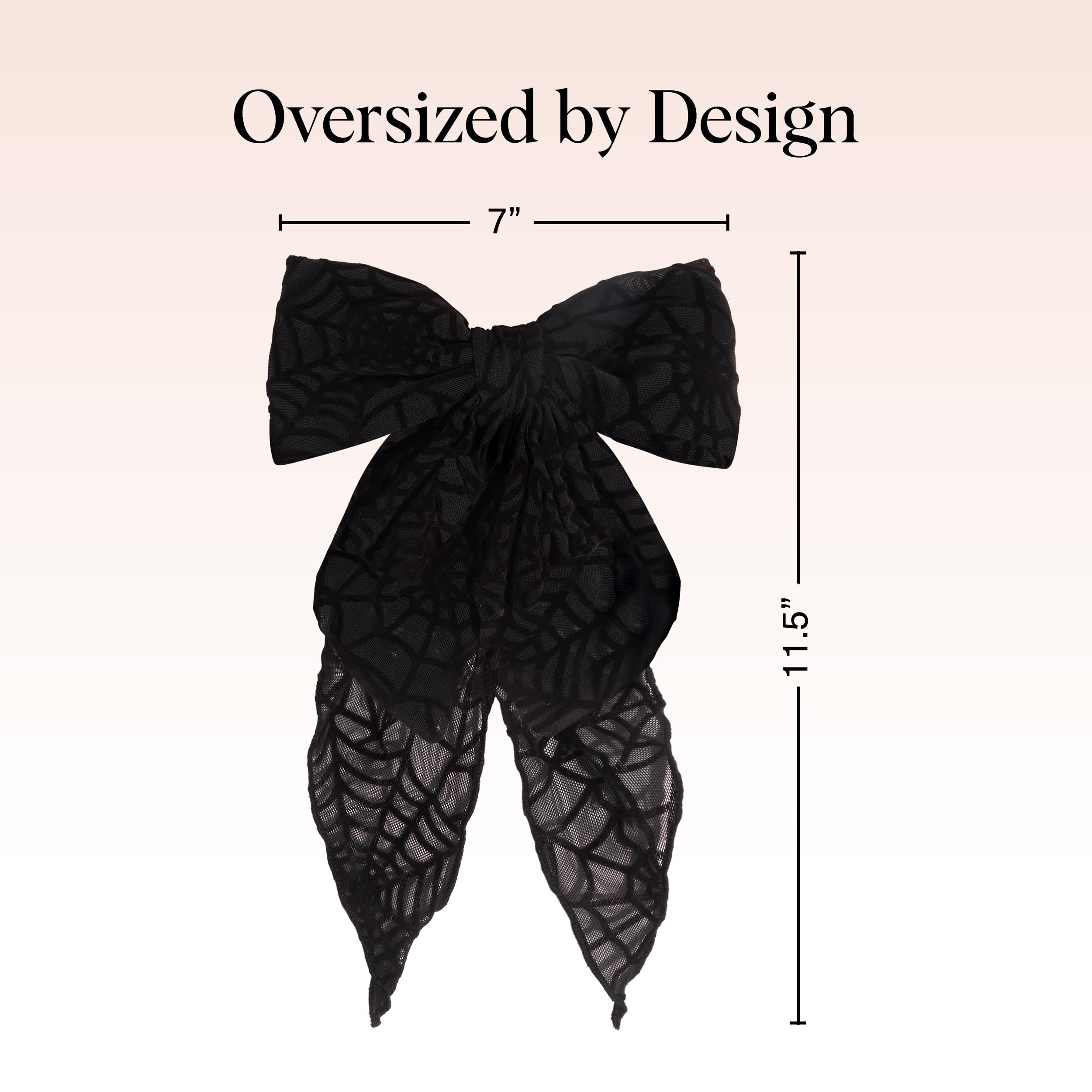 Kitsch black ribbon hair clip gift-ready packaging suggests a stylish gift for her
