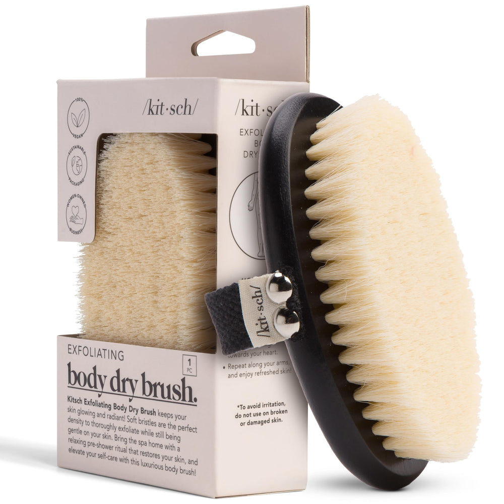 Kitsch dry brushing body brush with soft bristles for gentle exfoliation.