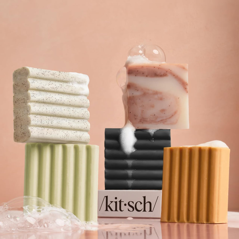 Kitsch exfoliating bar closeup reveals rich lather for daily cleansing ritual.