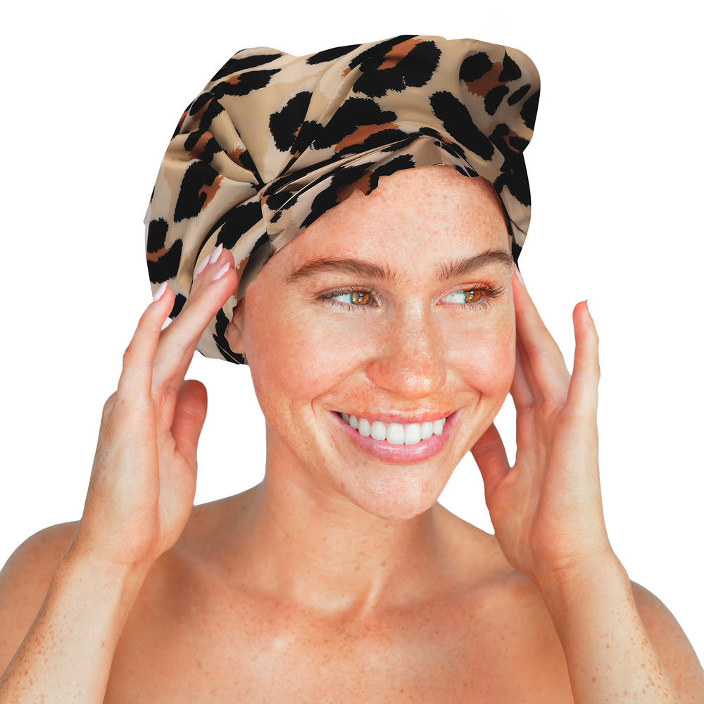 Kitsch leopard shower cap gift-ready packaging makes a chic present.