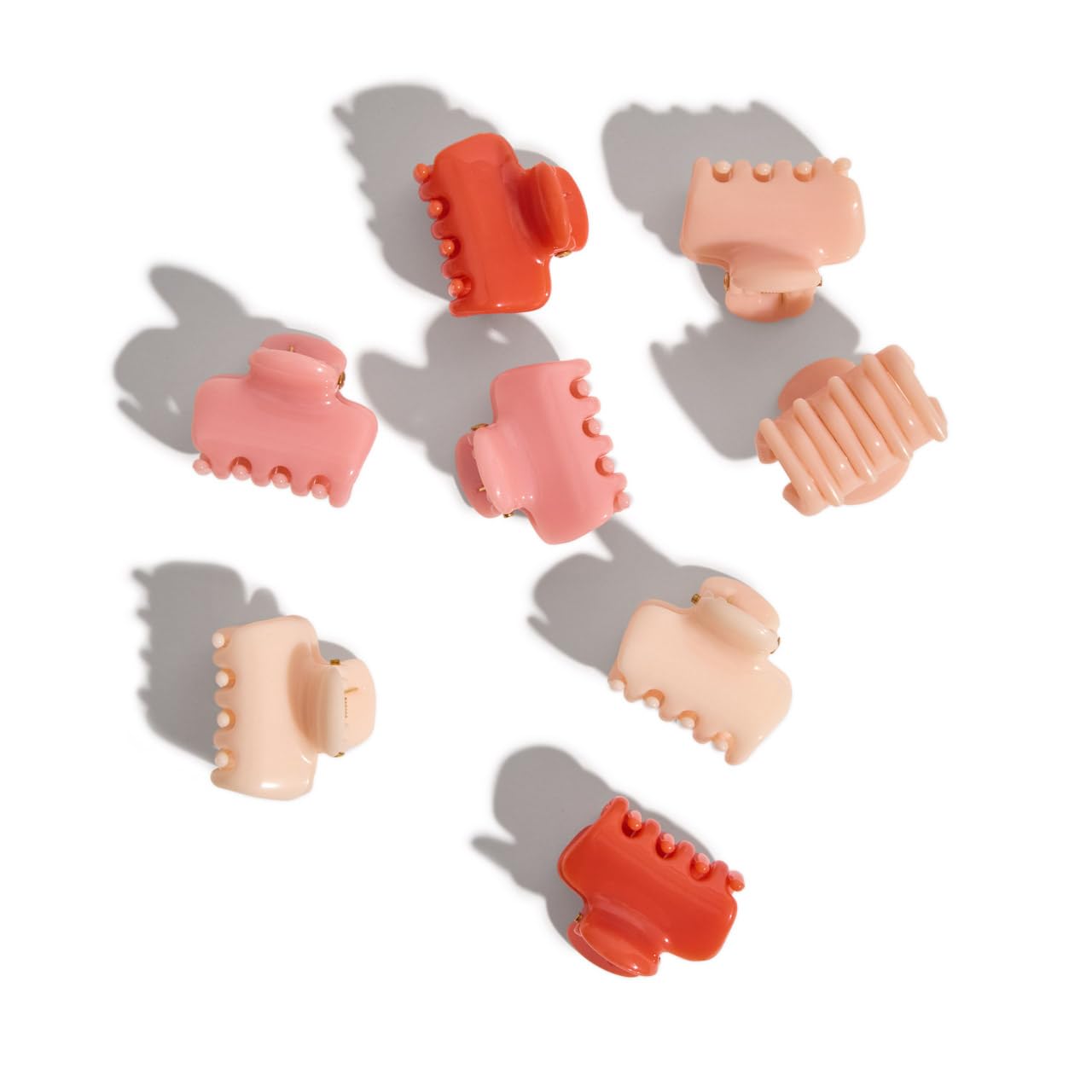 Kitsch mini claw clip designed for fine to medium hair holding subtle sections.