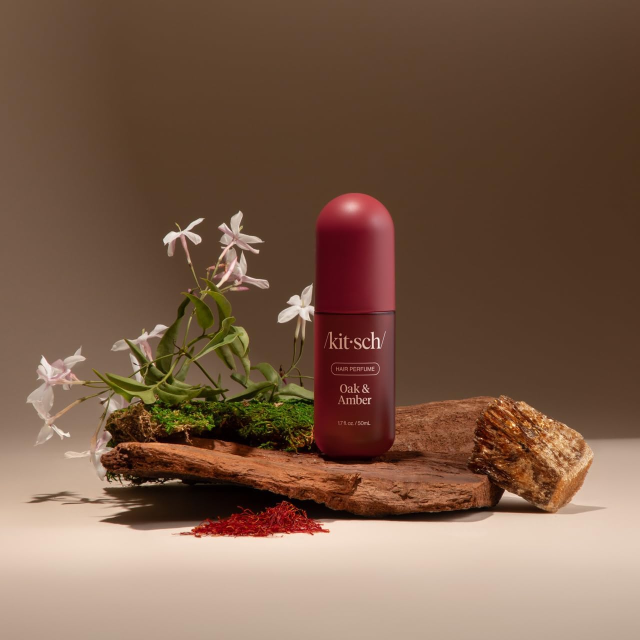 Layering Kitsch Oak & Amber with other fragrances for customization.