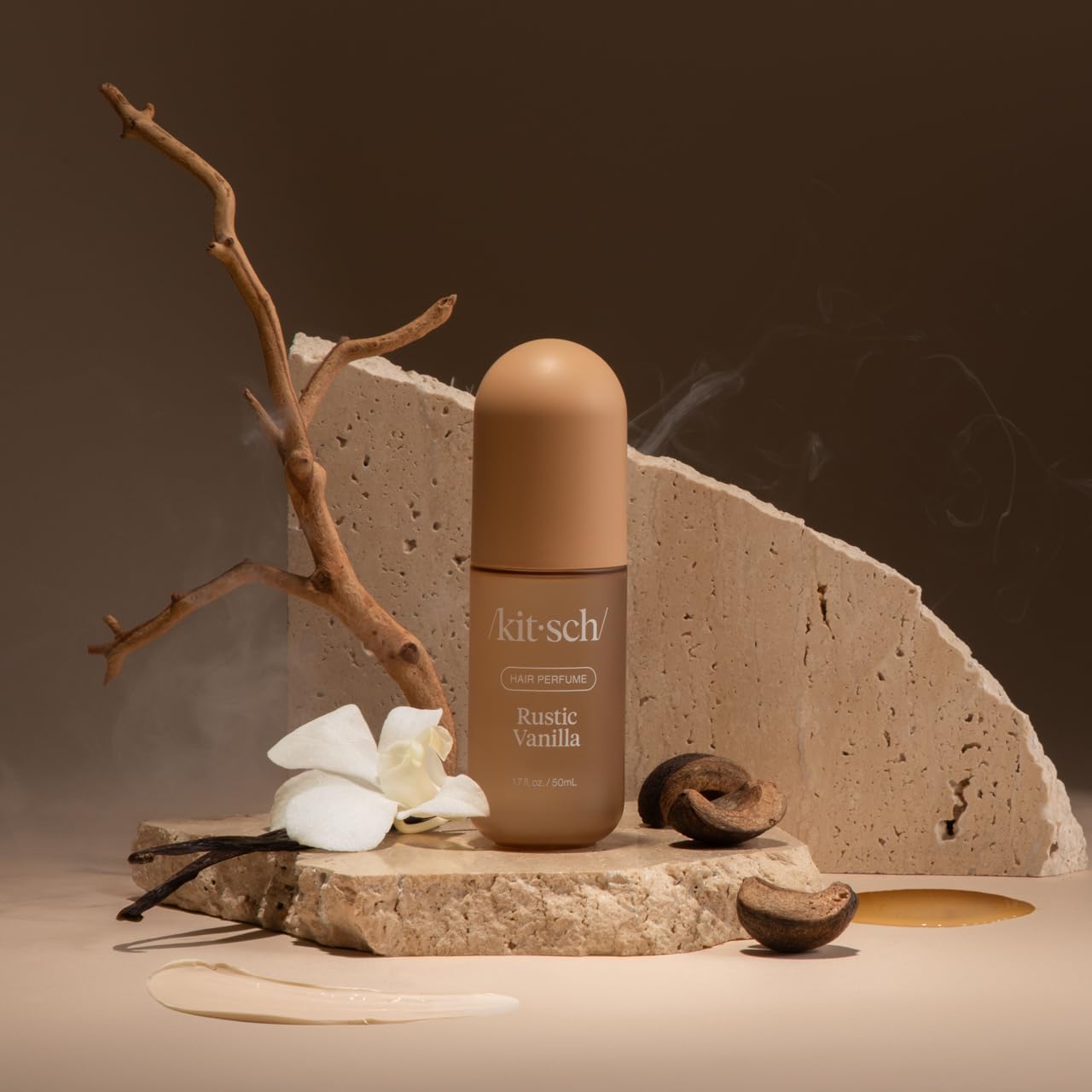 Kitsch Rustic Vanilla mist on hair for a subtle fragrance boost.