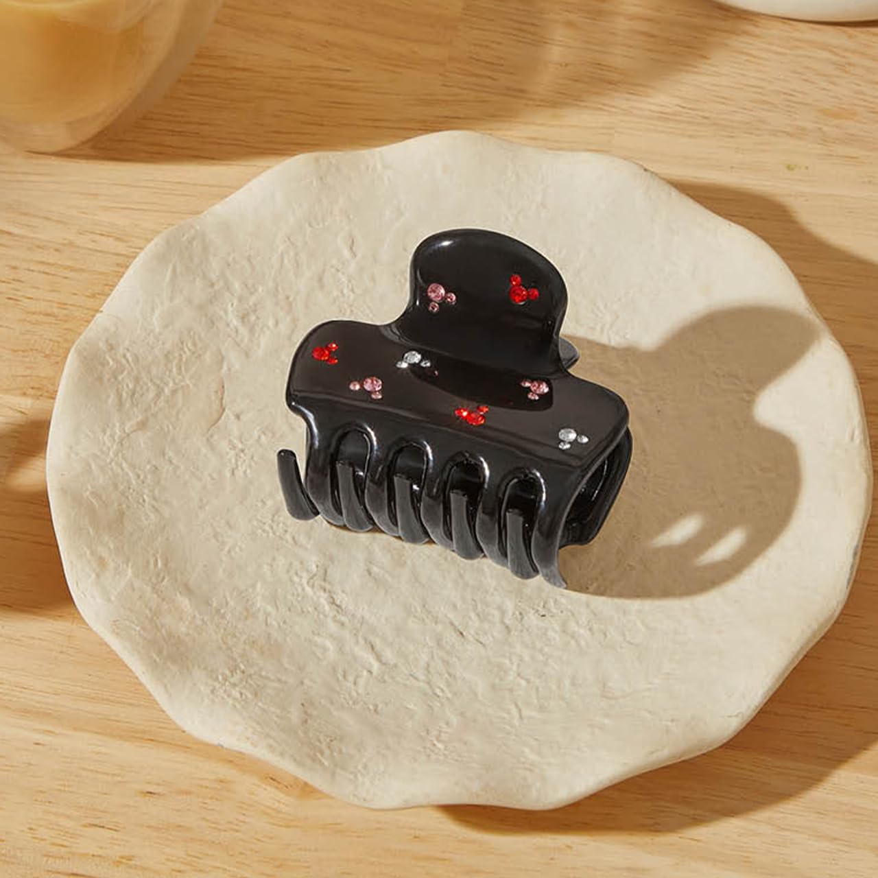 Kitsch unique flair claw clip stands out with puffed shape design.
