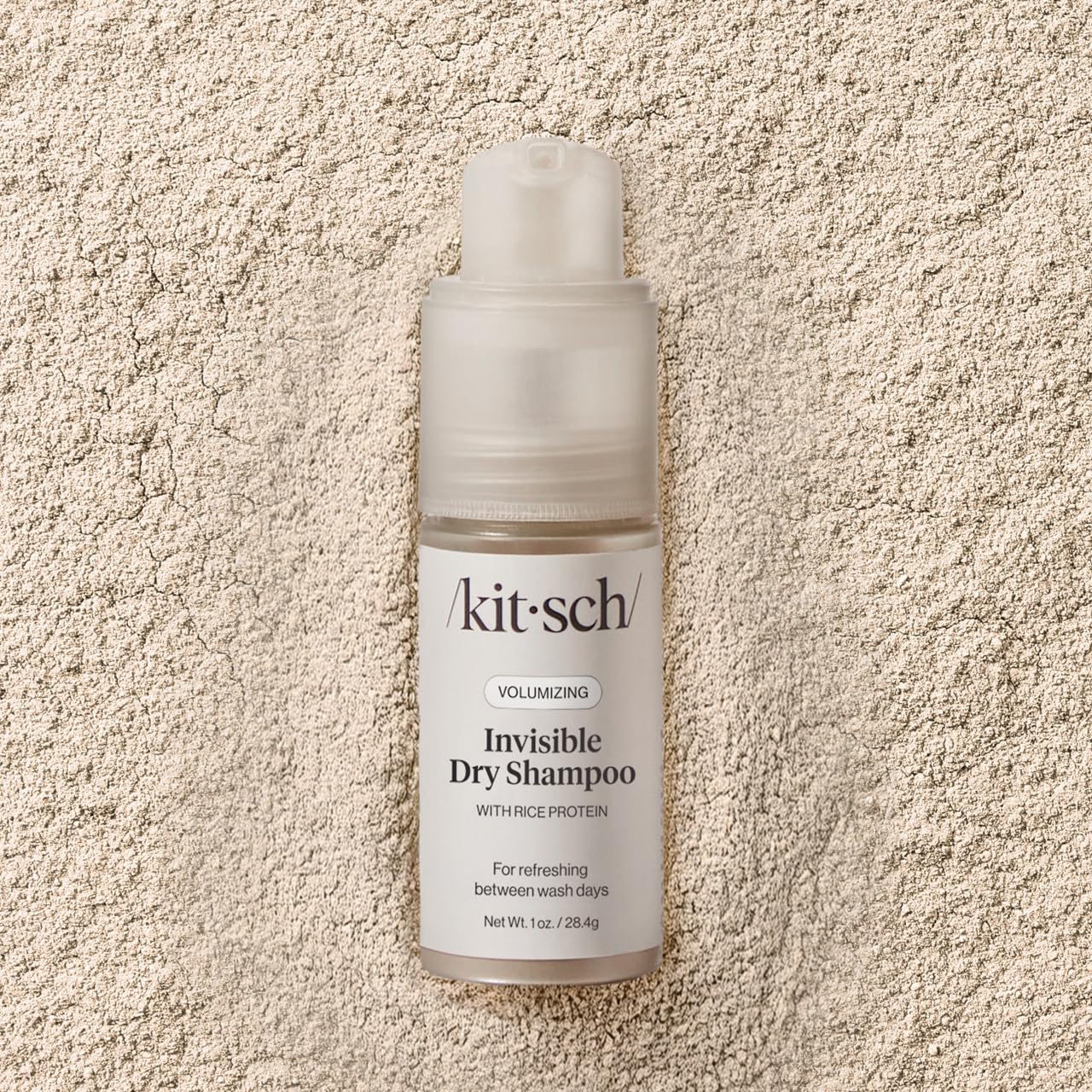 Kitsch aerosol-free powder blends into hair for texture and lift