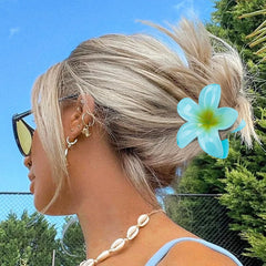 Kivzex Hawaiian Flower Hair Claw in purple pairs with evening looks and festivals