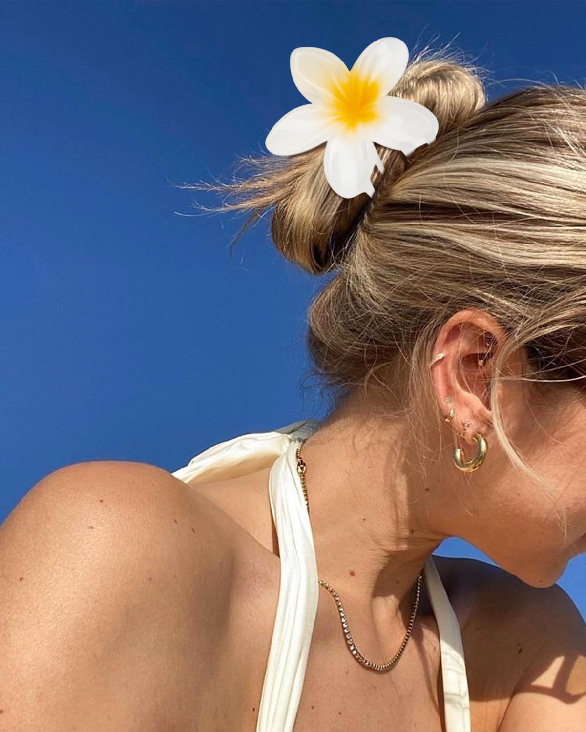 Kivzex Hawaiian Flower Hair Claw in white complements bridal or minimalist ensembles