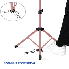 Klvied wig head stand on tripod offers steady support during blow-drying.
