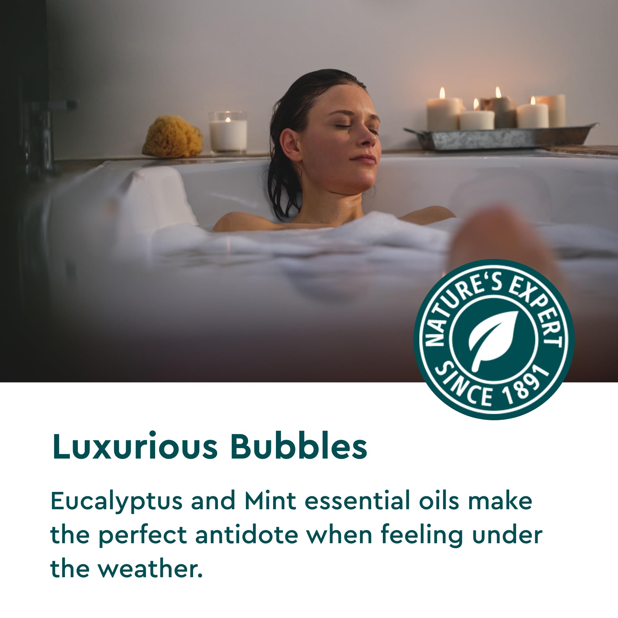 Steamy bathroom scene featuring Kneipp bath with colorful bubbles and warm light