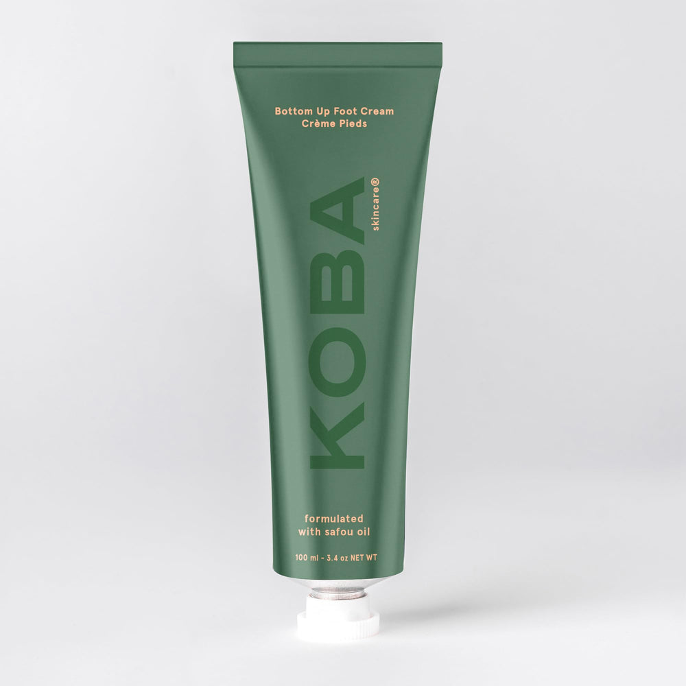 KOBA packaging display highlights vegan, natural ingredients like shea butter and safou oil.