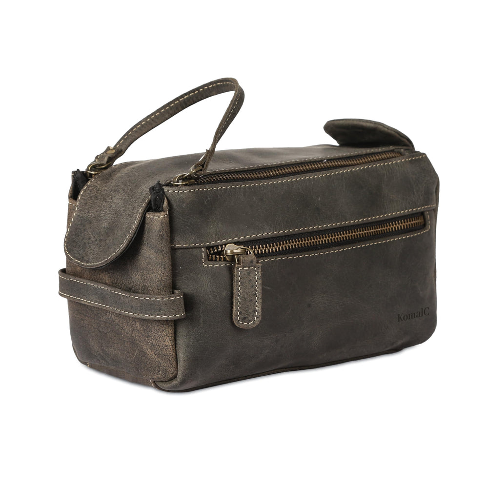 KomalC premium buffalo leather dopp kit front view, a durable travel essential.