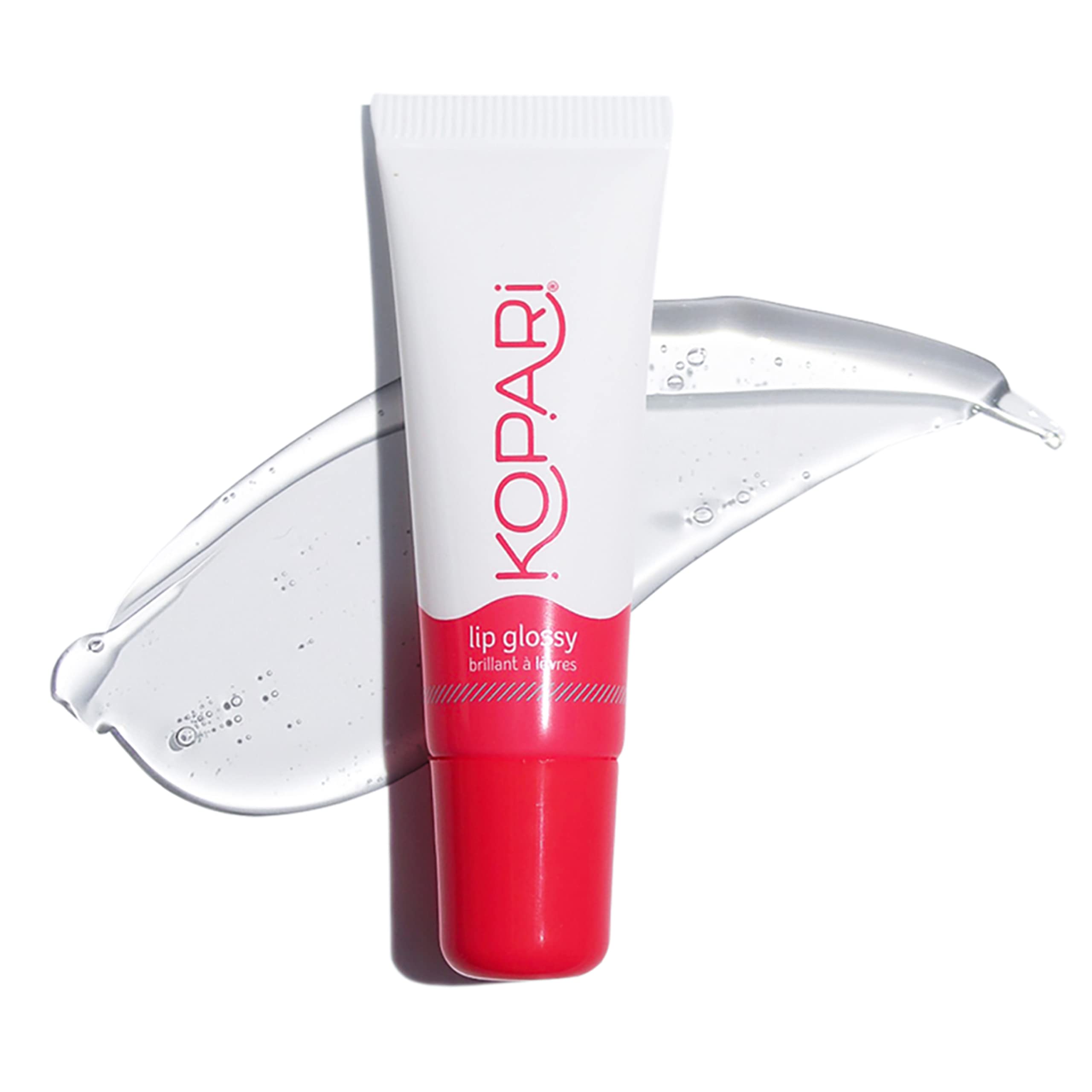 Kopari Coconut Lip Glossy clear bottle shows hydrating lip care.