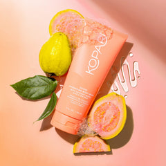 Kopari Guava Hydrating Body Wash foaming lather highlighting rich, gentle cleanse