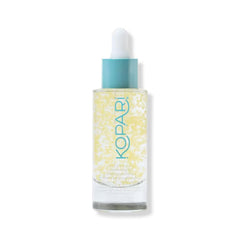 Kopari Star Bright serum bottle close-up highlights encapsulated Vitamin C for gentle daily brightening.