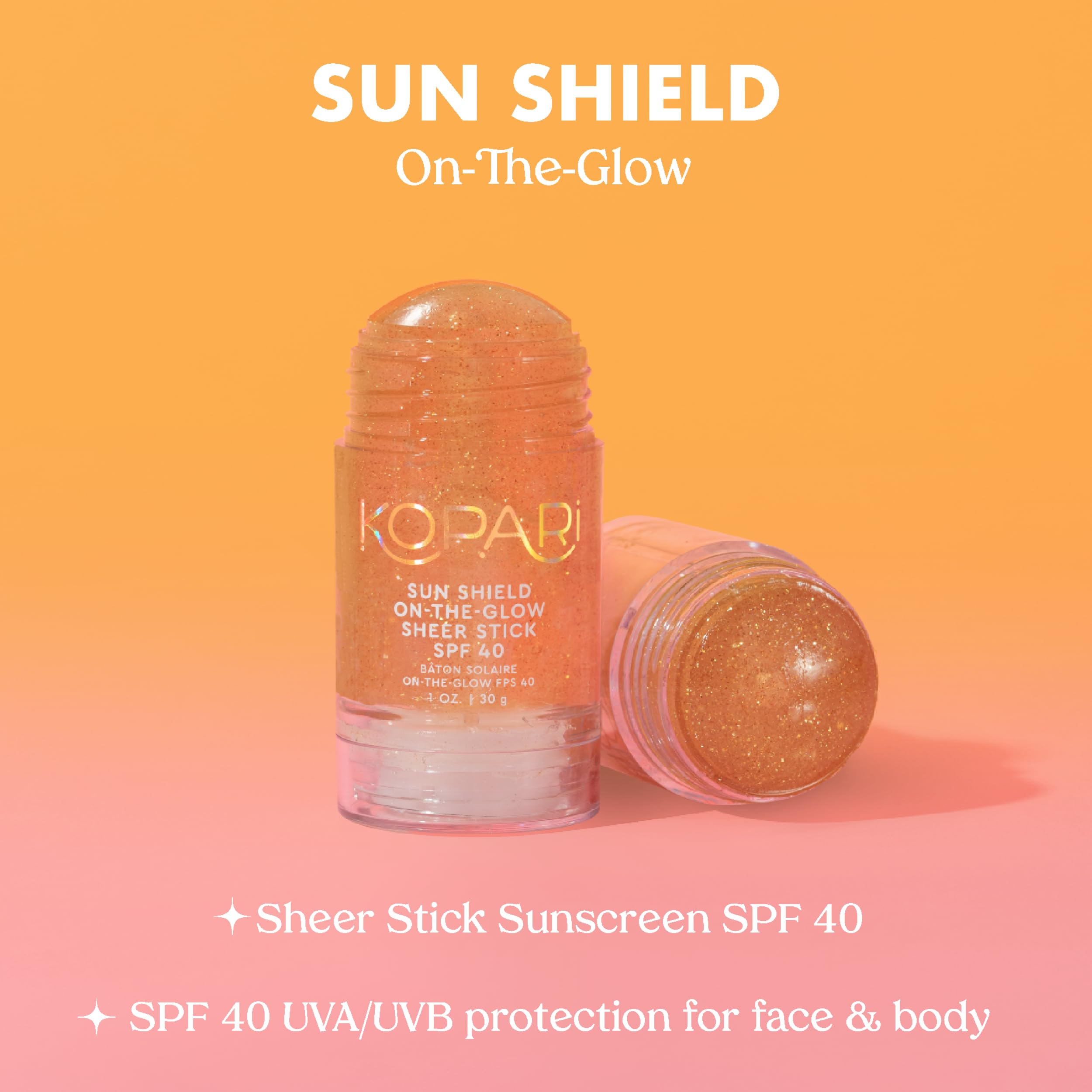 Kopari Sun Shield stick beside beach towel showing outdoor use