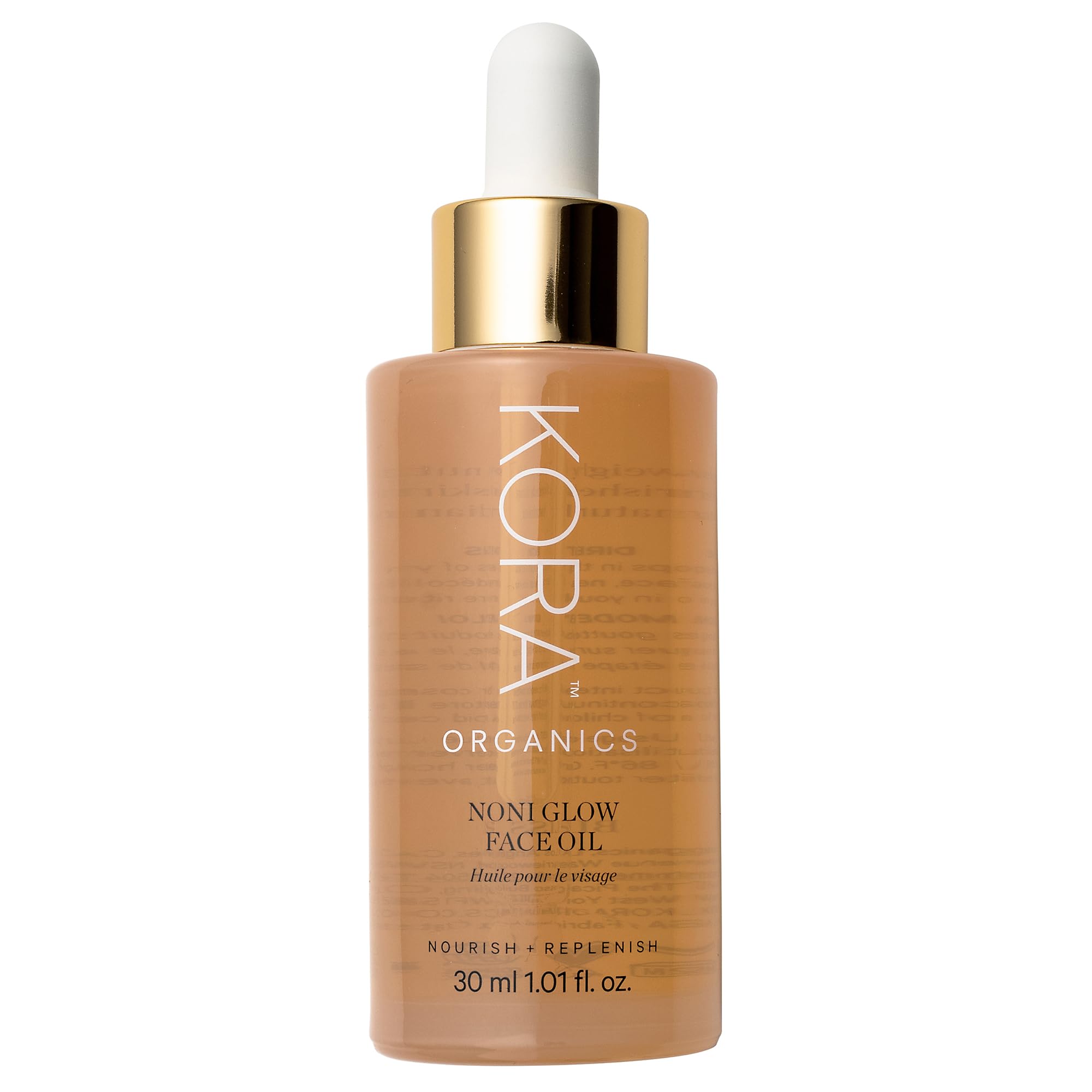 KORA Organics Noni Glow oil bottle closeup for radiant, hydrating skin care