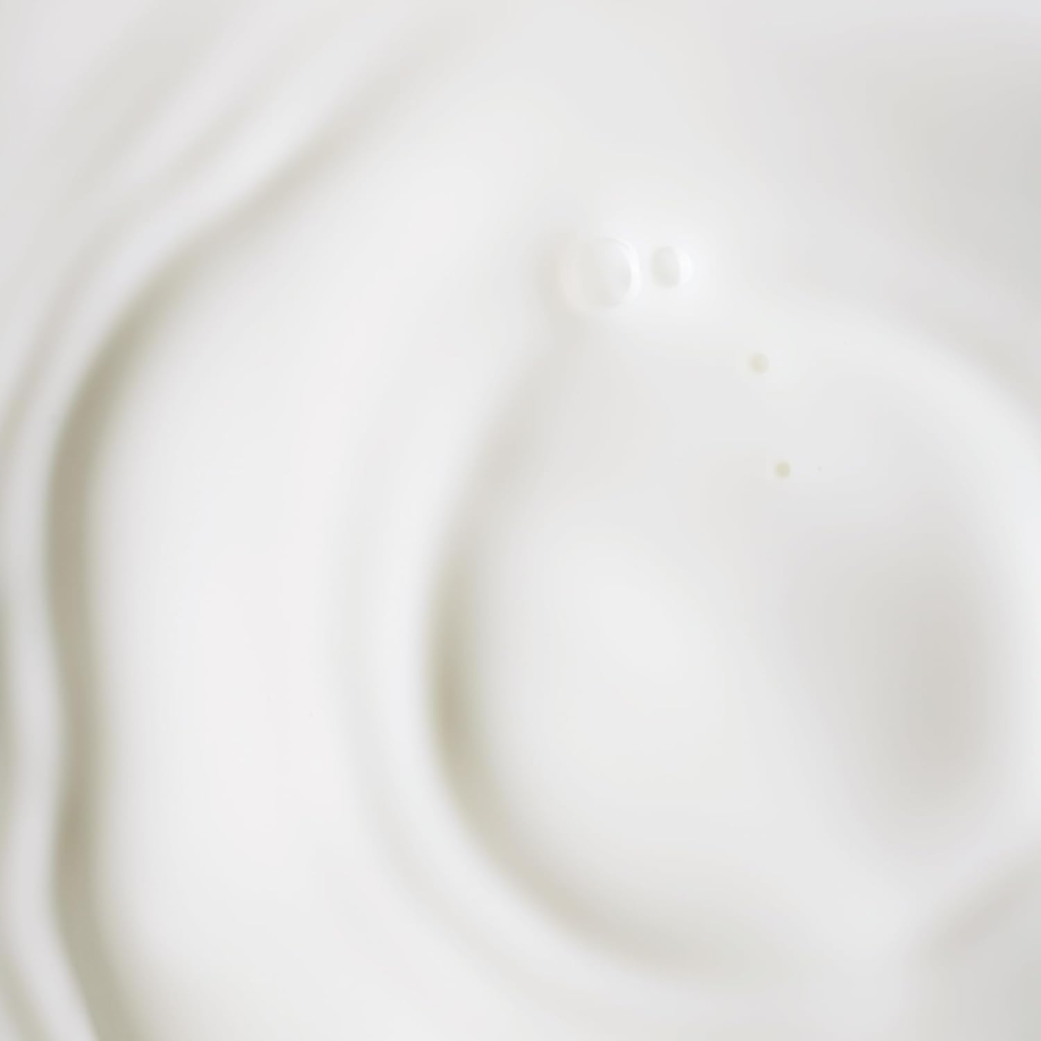 KORA Organics travel-size serum packaging ready for on-the-go skincare routines.
