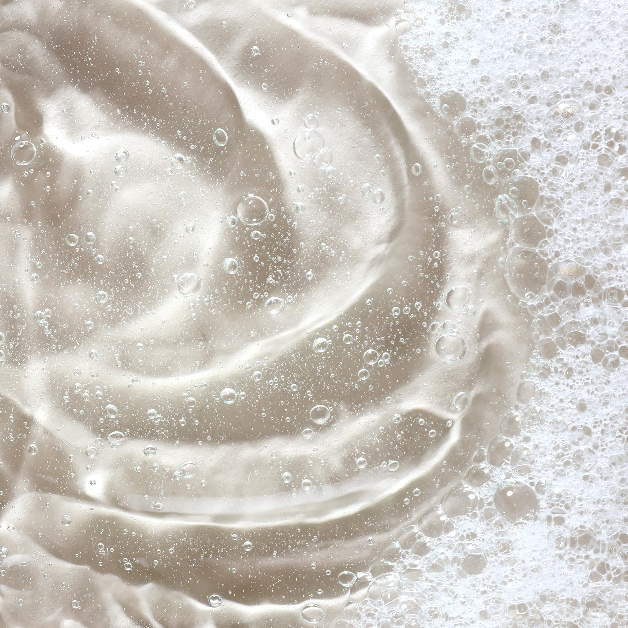 KORA Organics Turmeric Glow Foaming Cleanser noni extract visible on label for nourishing skin feel.