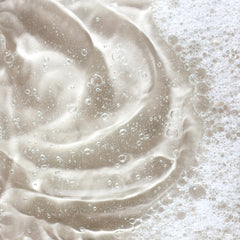 KORA Organics Turmeric Glow Foaming Cleanser noni extract visible on label for nourishing skin feel.
