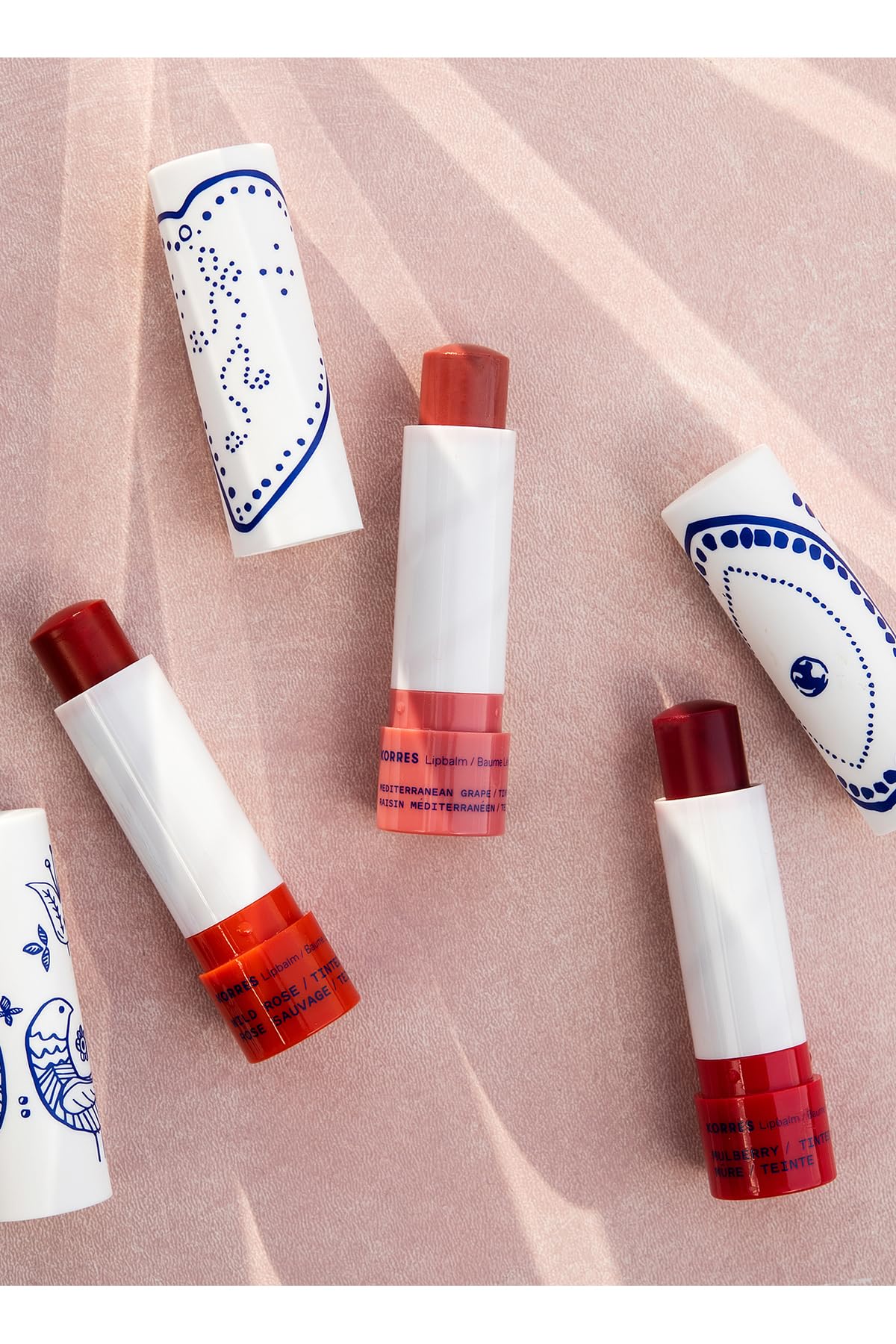 KORRES Lip Butter Stick Mulberry Tinted twist action close-up emphasizes easy on-the-go hydration